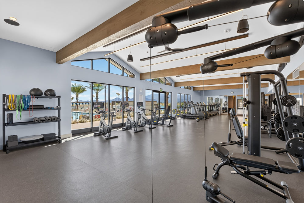 Exercise bikes and strength equipment in Cotino's Artisan Club fitness center. Photograph by Mark Miller, October 13, 2026.