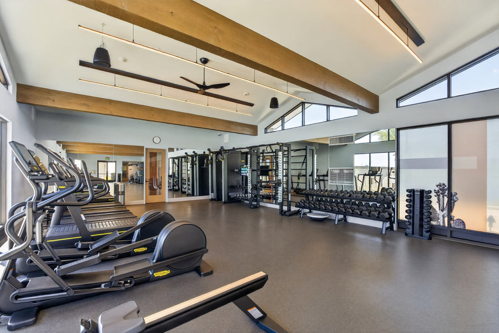 Cardio machines, free weights and an open workout area in the fitness center at Cotino. Photograph by Mark Miller, October 13, 2026.