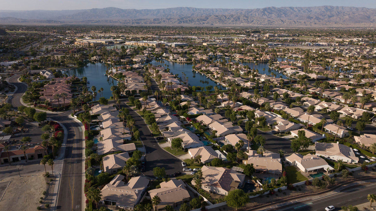 Lake La Quinta homes, streets and lake in their wider desert setting. Photograph by Mark Miller, May 24, 2026.