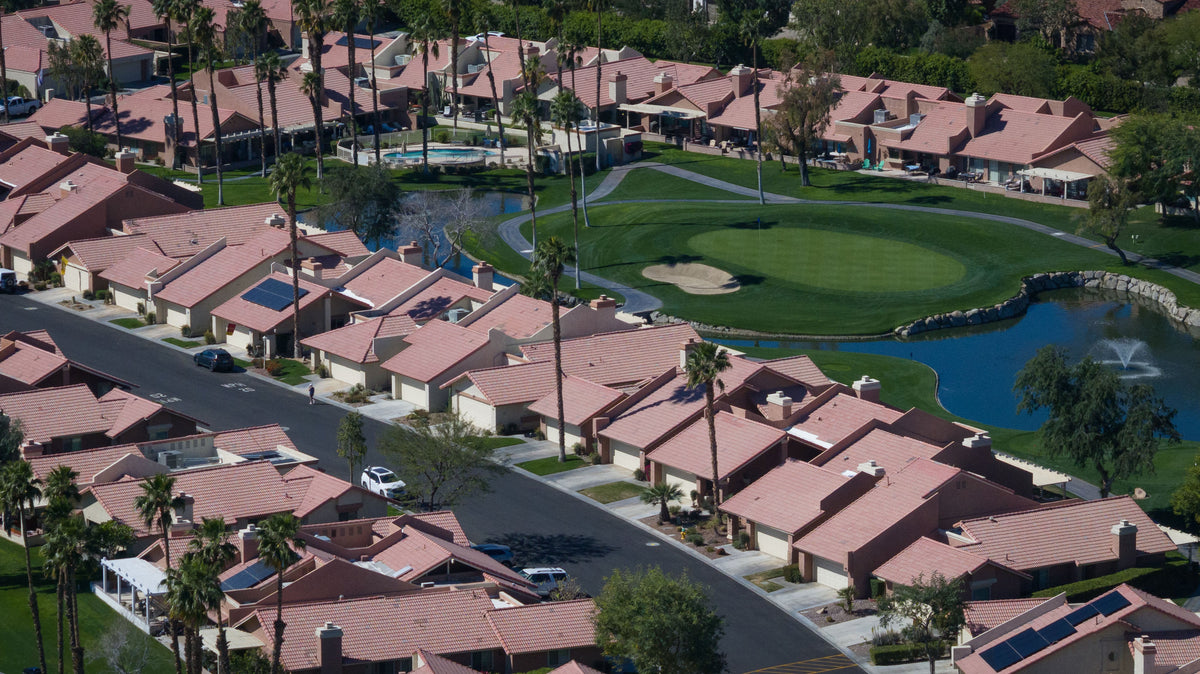 Oasis homes beside fairways, lakes and shared pool areas. Photograph by Mark Miller, March 12, 2026.