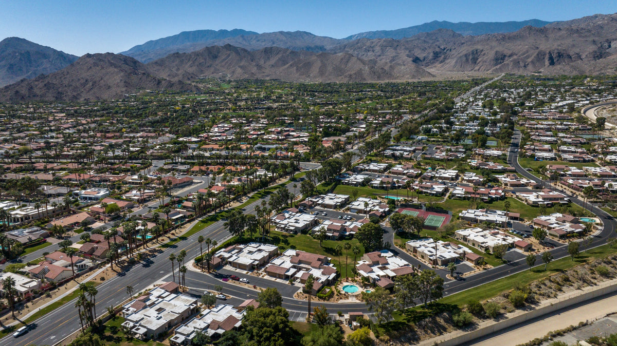 Residential streets, shared green spaces and homes beneath the foothills. Photograph by Mark Miller, April 20, 2025.