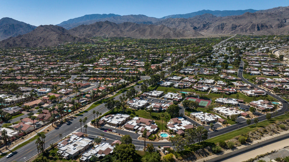 Residential streets, shared green spaces and homes beneath the foothills. Photograph by Mark Miller, April 20, 2025.
