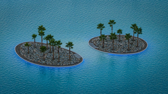Illuminated palm islands at Cotino lagoon in Rancho Mirage at dusk