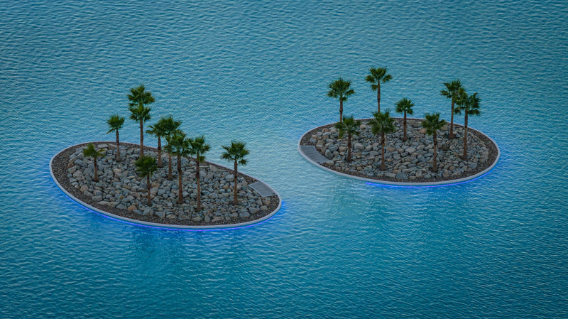 Illuminated palm islands at Cotino lagoon in Rancho Mirage at dusk