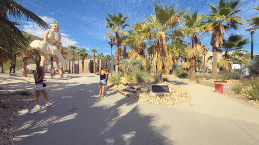 The Desert Inn commemorative plaque in a landscaped area beside Forever Marilyn in downtown Palm Springs. Photograph by Mark Miller, October 20, 2026.