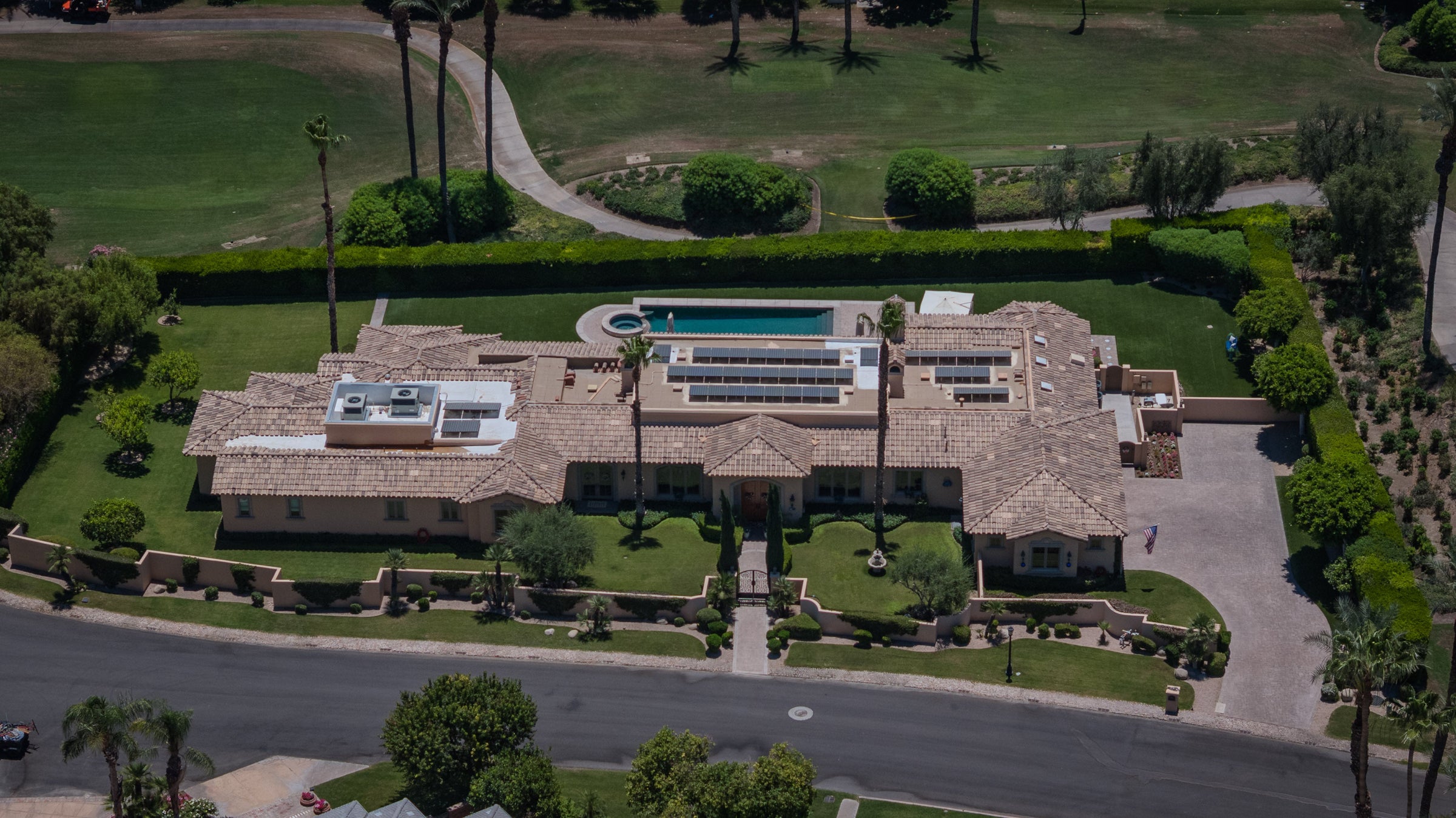 Aerial estate in Eldorado Country Club in Indian Wells, California, with golf course frontage