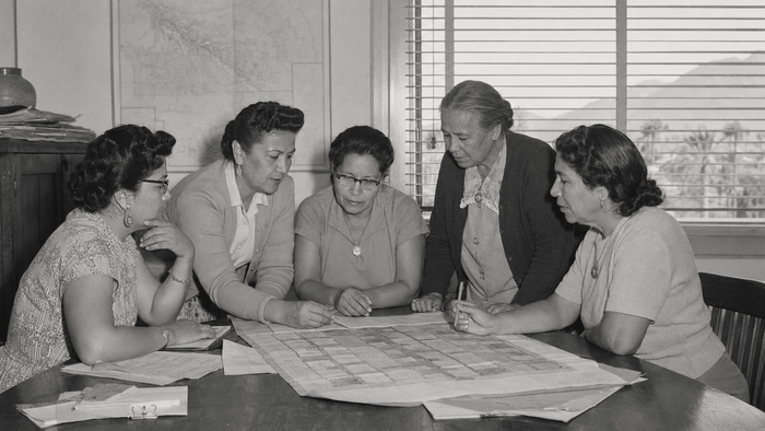 AI-generated reenactment. Five Agua Caliente women leaders review Palm Springs land plans.