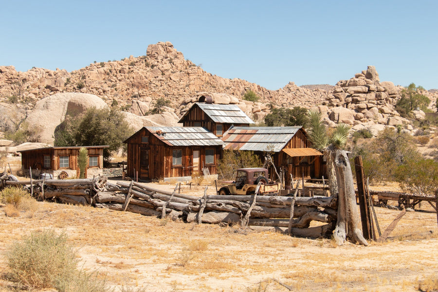 Wooden buildings at Keys Ranch amid granite boulders in Joshua Tree National Park. Photograph: NPS / Paul Martinez.