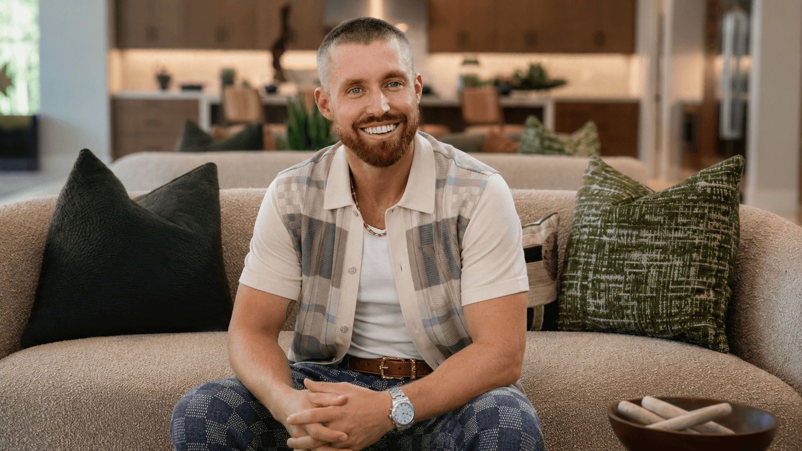 Mark Miller posing inside a Griffin Ranch home in La Quinta