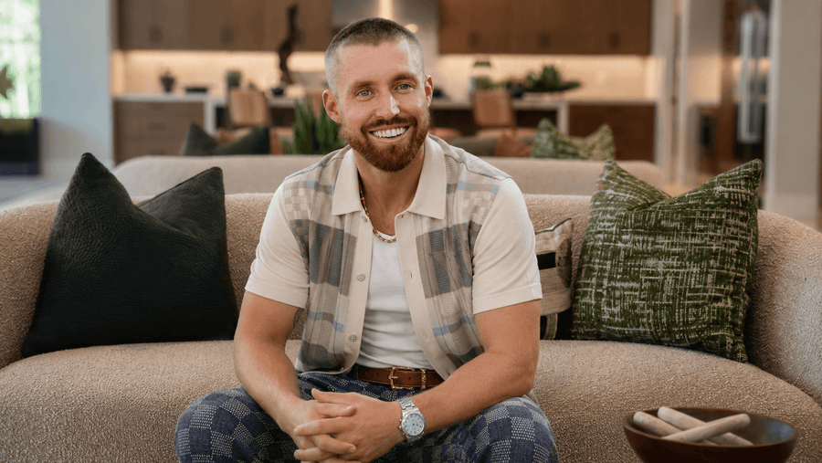 Mark Miller posing inside a Griffin Ranch home in La Quinta
