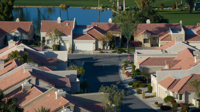 Aerial view of Palm Desert Resort Country Club homes and lake