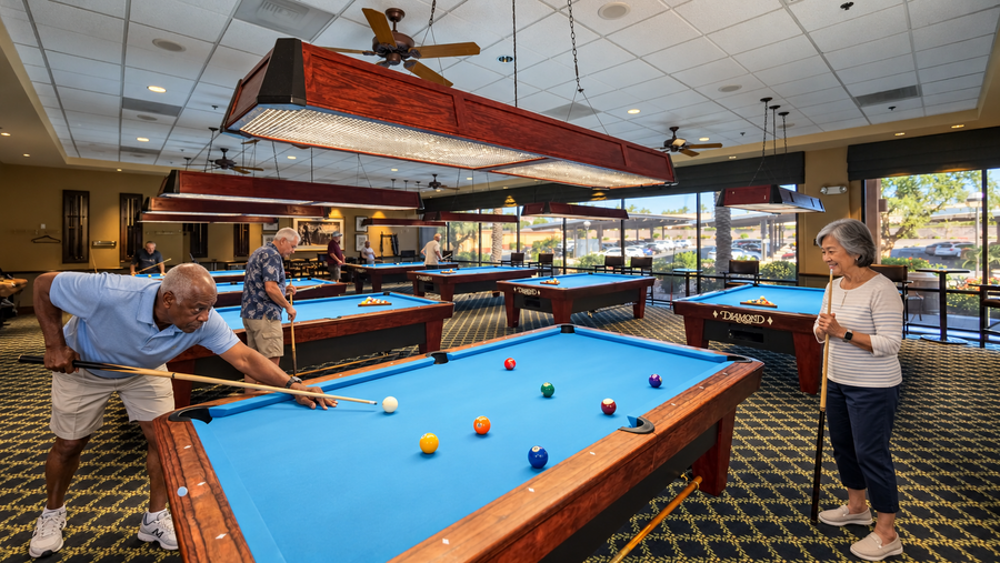 Older adults playing billiards at Sun City Palm Desert; AI-enhanced from Mark Miller’s original photograph.
