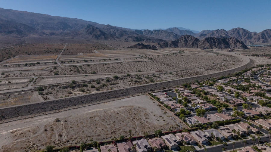 September 30, 2026 — Wide aerial view of Trilogy La Quinta homes, Dike No. 4 and open land