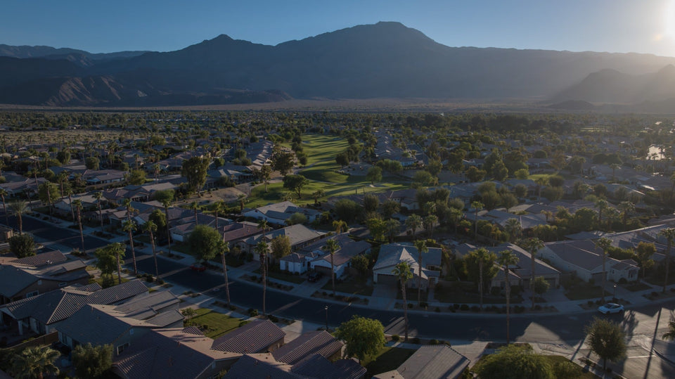 Trilogy La Quinta homes and golf course beside the mountain foothills
