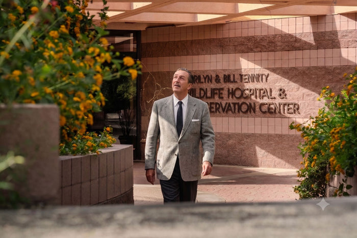 AI-generated illustration of Walt Disney walking through The Living Desert Zoo and Gardens in Palm Desert