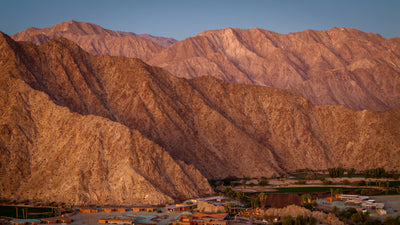 first light touching the santa rosa mountains near silverrock golf course