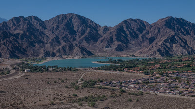 Elevated view of Lake Cahuilla in La Quinta, with desert terrain, nearby homes and the Santa Rosa Mountains, photographed by Mark Miller on September 30, 2026.