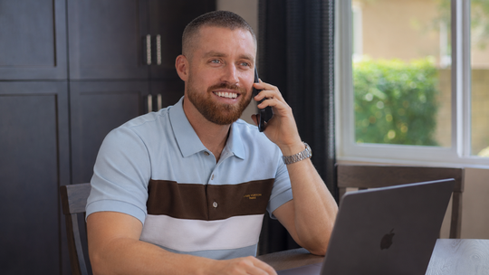 Real estate agent Mark Miller putting togther a deal between buyer and seller.