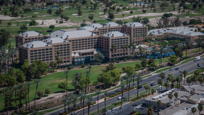 Renaissance Esmeralda hotel buildings beside a golf course, with the pool at right.