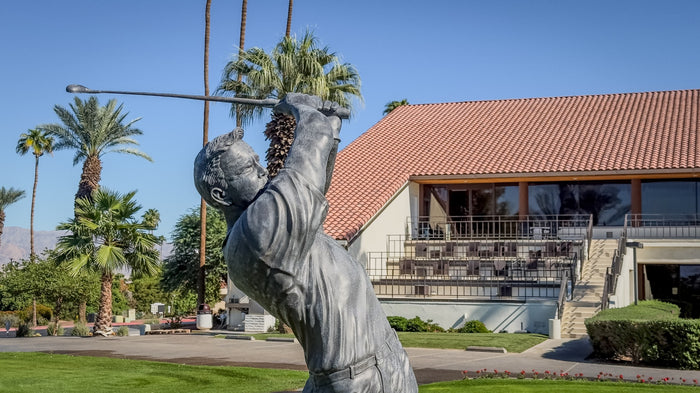 Arnold Palmer statue in front of the clubhouse at Bermuda Dunes Country Club, California. Photograph by Mark Miller.