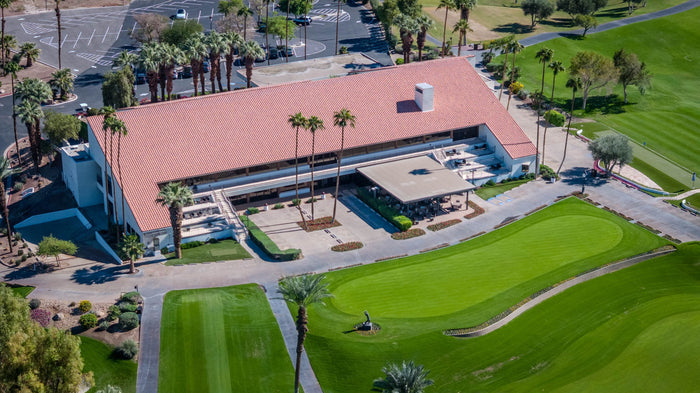 Aerial view of the clubhouse terrace and adjacent putting green at Bermuda Dunes Country Club, California. Photograph by Mark Miller.