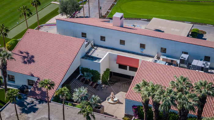 Aerial view of the clubhouse roof, entrance and surrounding grounds at Bermuda Dunes Country Club, California. Photograph by Mark Miller.