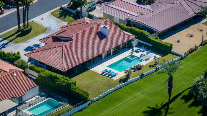 Backyard swimming pool at a home overlooking the golf course at Bermuda Dunes Country Club, California. Photograph by Mark Miller.