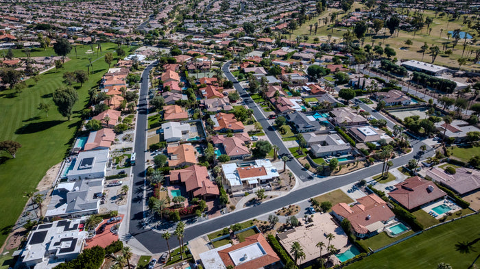 Aerial panorama of residential streets and the golf course at Bermuda Dunes Country Club, California. Photograph by Mark Miller.
