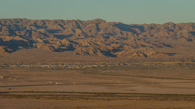 Layered desert mountains and open terrain near Bombay Beach, photographed by Mark Miller in September 2026