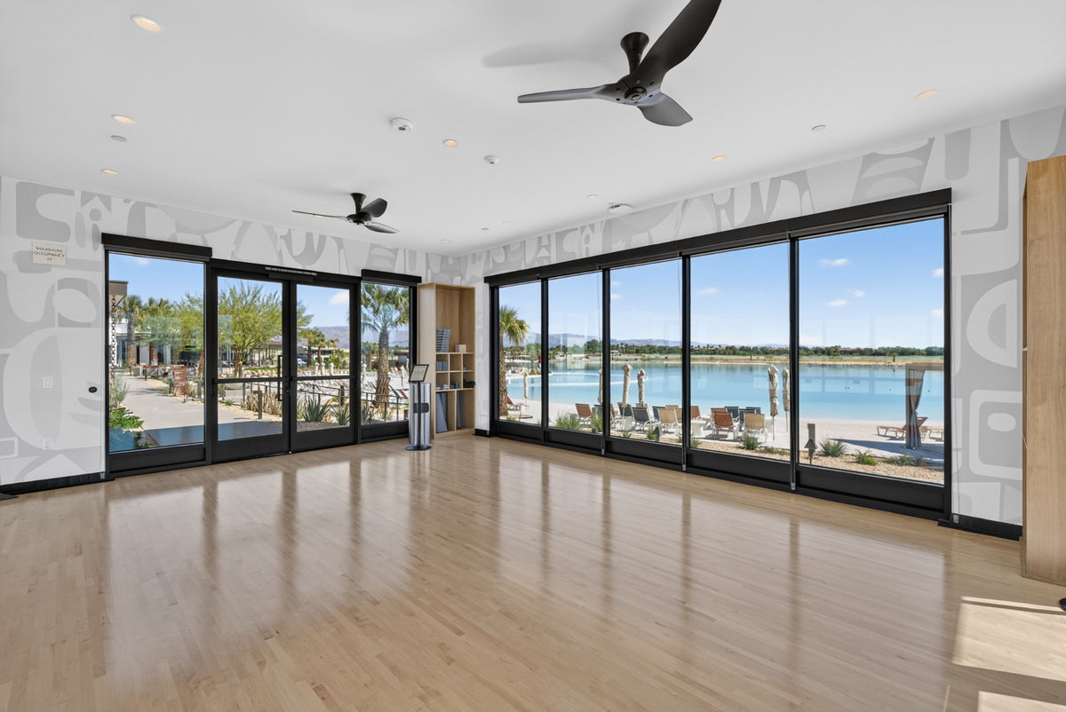 Cotino's Movement Studio with wood flooring and windows overlooking Cotino Bay. Photograph by Mark Miller, October 13, 2026.