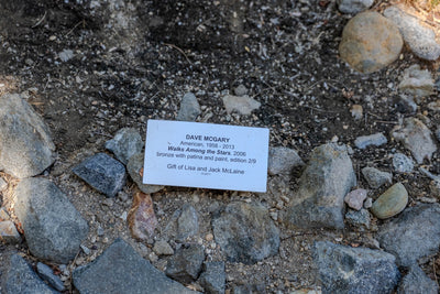 Plaque identifying Dave McGary’s Walks Among the Stars, 2006, bronze with patina and paint, edition 2/9.