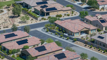 Residential streets, homes and desert landscaping at Del Webb Rancho Mirage, California