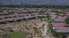 Walking paths and desert landscaping between the homes at Del Webb Rancho Mirage, California