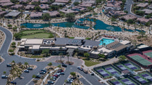 The Outlook clubhouse, pool, tennis and pickleball courts from above at Del Webb Rancho Mirage, California