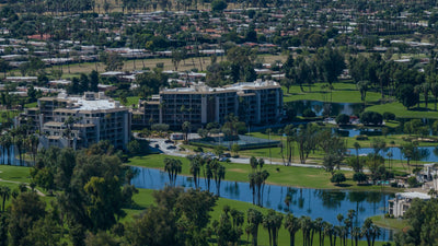 Desert Island’s lake, condominium buildings and golf course in Rancho Mirage, photographed by Mark Miller on October 13, 2026.