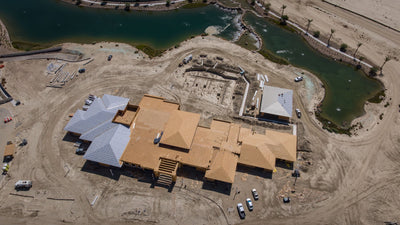 Aerial view of the Oasis Clubhouse and surrounding construction at Desert Retreat, Indio, photographed by Mark Miller on September 25, 2026.