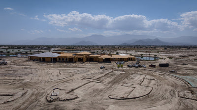 Wide view of the Oasis Clubhouse construction site at Desert Retreat, Indio, photographed by Mark Miller on September 25, 2026.