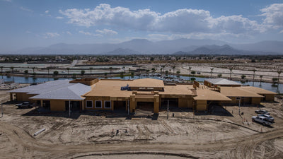 Oasis Clubhouse exterior construction progress at Desert Retreat, Indio, photographed by Mark Miller on September 25, 2026.
