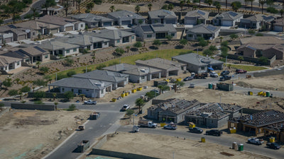 Close aerial view of new homes at different stages of construction at Desert Retreat, Indio, photographed by Mark Miller on September 25, 2026.