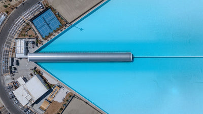 Overhead view of the wave generator, lagoon and nearby pickleball courts at DSRT Surf in Palm Desert, September 10, 2026.