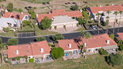Overhead view of Duna La Quinta homes, patios, streets and adjacent fairway