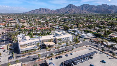 Hotel Paseo in Palm Desert with surrounding neighborhoods and mountains — original photograph by Mark Miller, October 29, 2026.