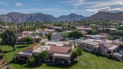 Ironwood Country Club residences and lawns with a mountain backdrop