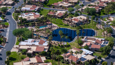 Ironwood Country Club homes, pools and palm-lined streets