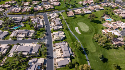 Ironwood Country Club homes bordering a golf green and bunkers
