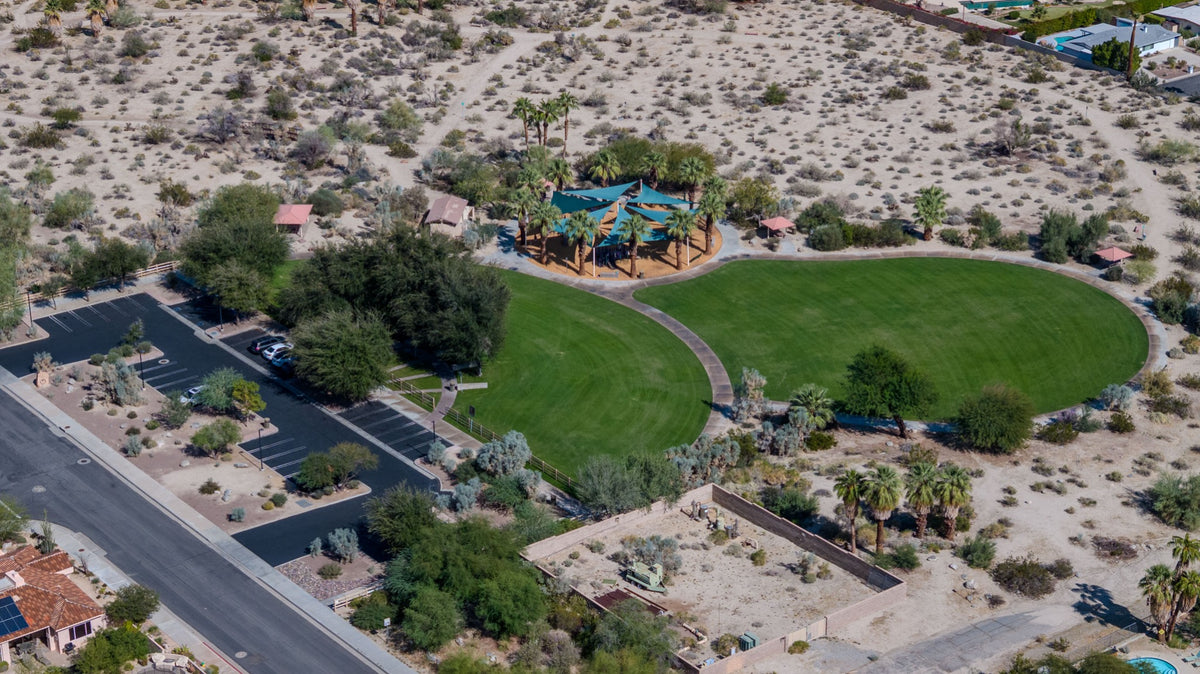 Aerial view of Ironwood Park’s shaded playground, lawns, picnic shelters and parking in Palm Desert. Photograph by Mark Miller, October 29, 2026.