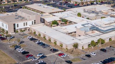 JFK Memorial Hospital buildings, courtyard and parking — Mark Miller, October 29, 2026