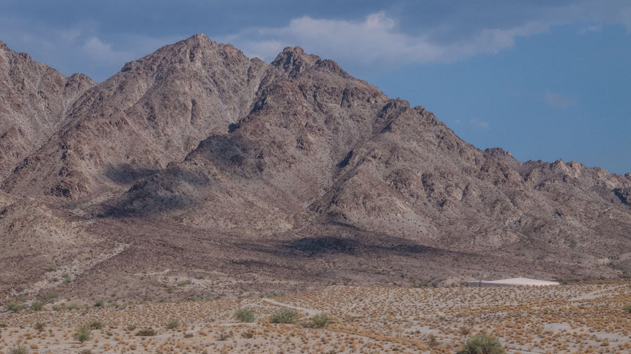 Rocky La Quinta Cove mountains above a broad desert shrubland