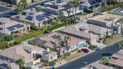 Closer aerial of tile-roofed homes, palms and backyard pools at Montage at Mission Hills. Mark Miller, October 20, 2026.