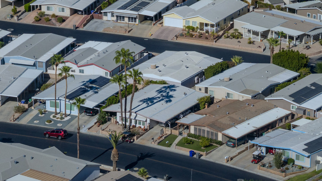 Aerial detail of Palm Desert Greens homes, patios, carports and an interior street
